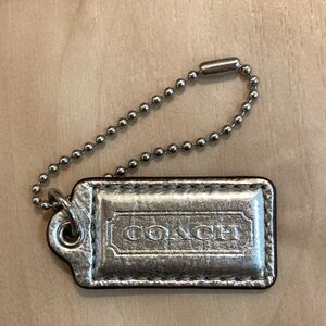 Silver metallic leather Coach key chain